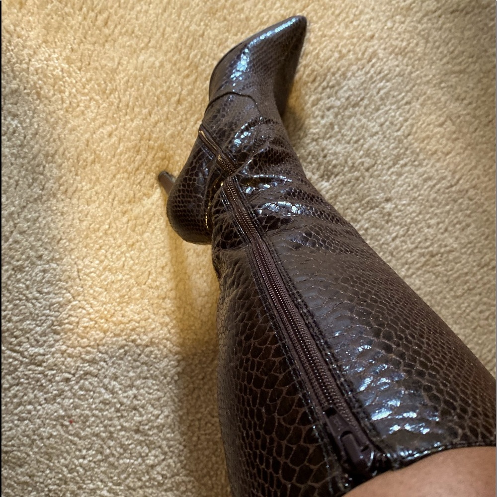 Rich Brown leather animal print boots.